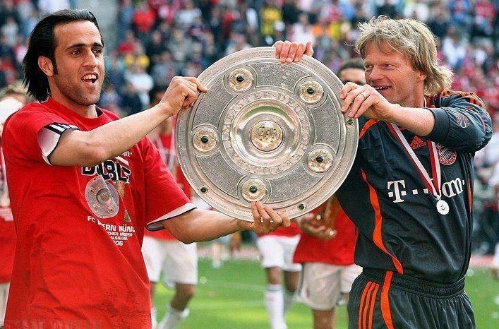 Ali Karimi With The Trophy